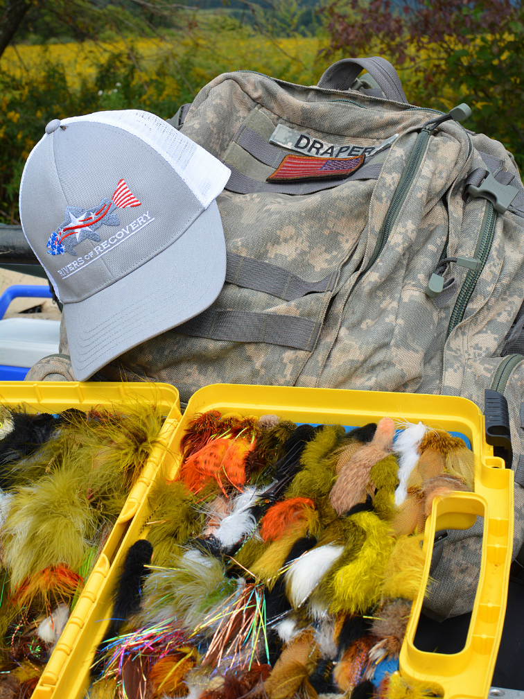 a close up of a fly-fishing tackle box